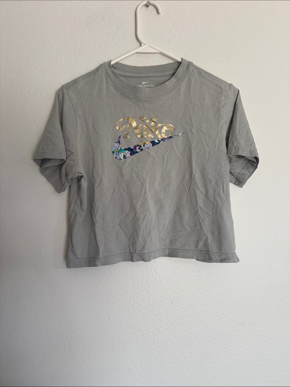 Nike Gray Cropped Tee with Gold Script and Floral Swoosh